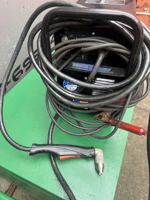 Thermal Dynamics Cutmaster 50 Plasma Cutter.  Works Great.