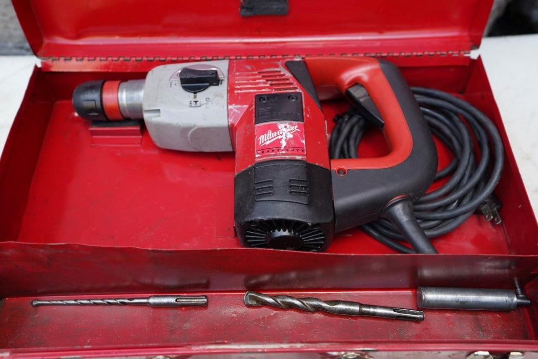 Milwaukee 1 inch Rotary Hammer Drill.  Works Fine.