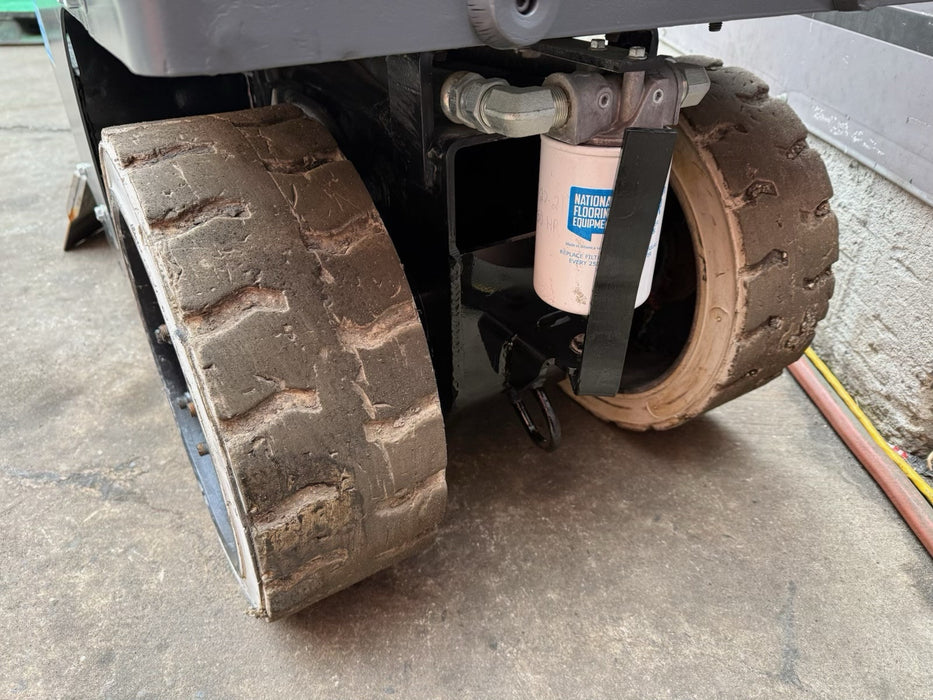 2017  NATIONAL 5700  RIDE ON ELECTRIC FLOOR SCRAPER.