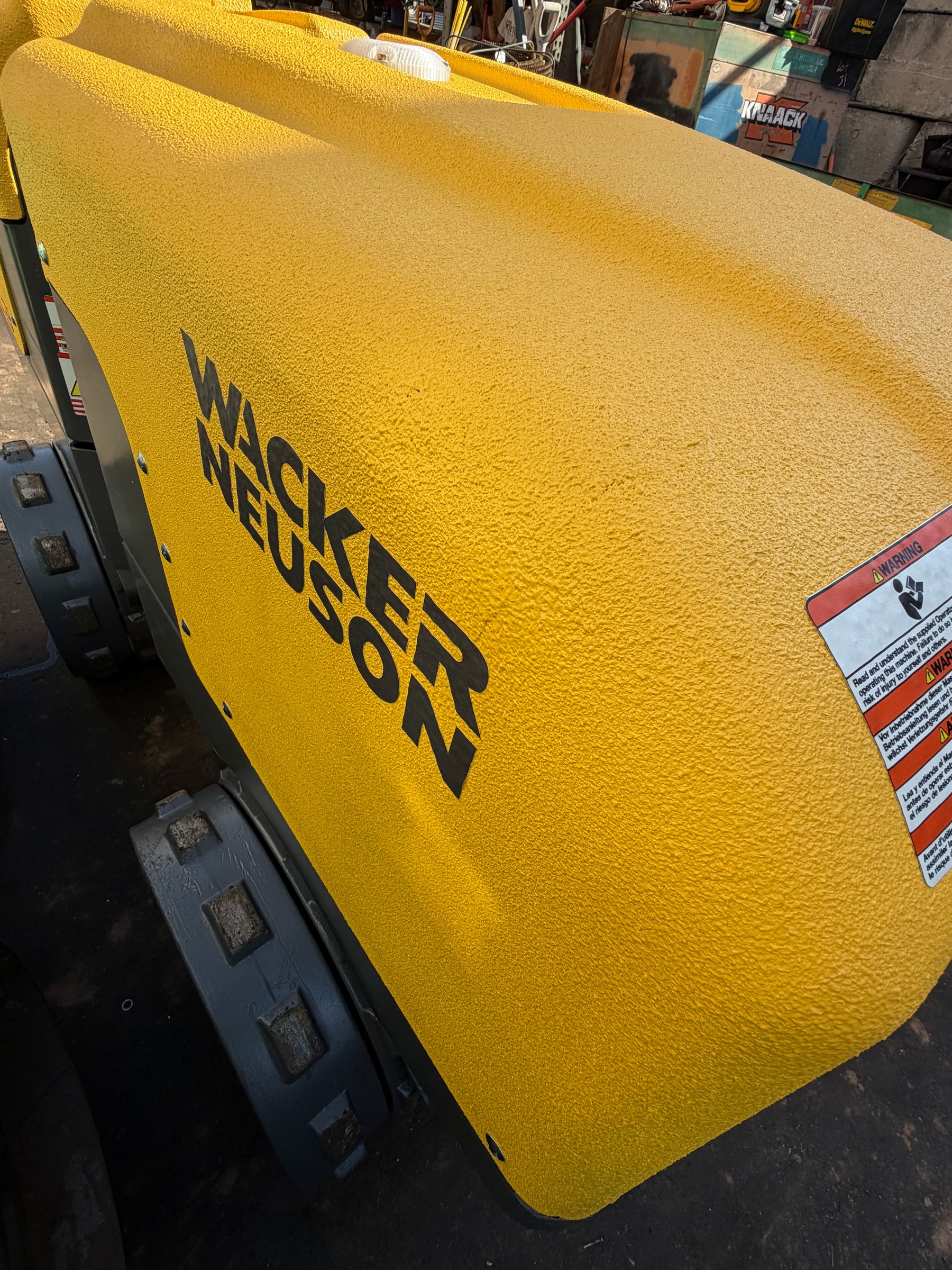 Wacker Neuson trench roller after yellow Raptor Liner coating