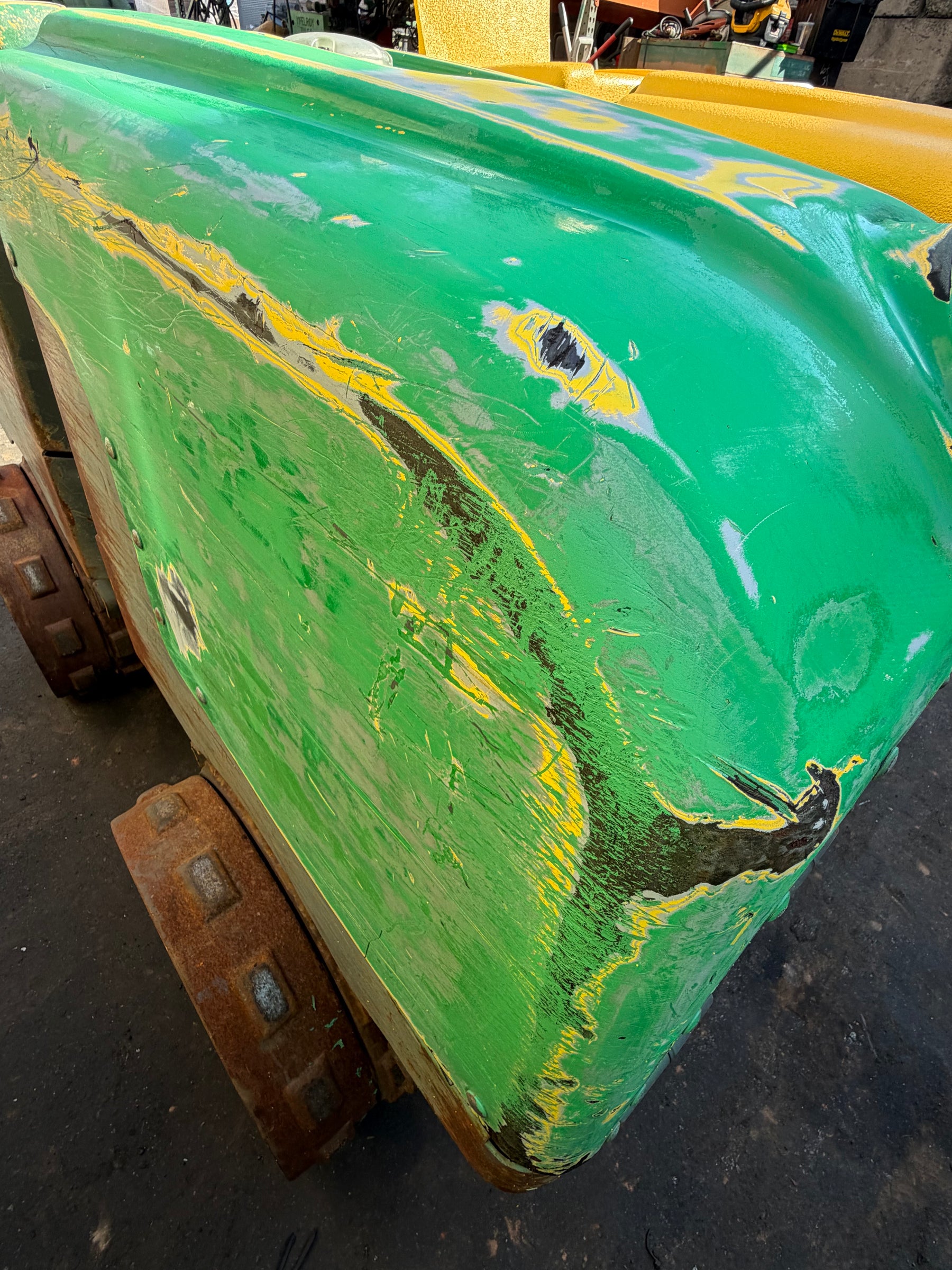 Worn trench roller before Raptor Liner coating